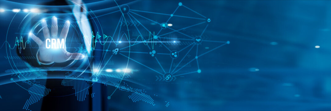 Businessman hand hold text CRM, client databases, sales tracking, customer retention, pipeline management, personalized engagement, and loyalty solutions.