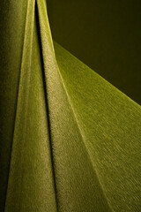 Abstract background made of crepe paper in shades of green