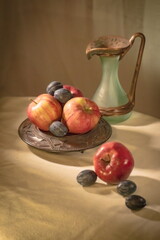 Beautiful background with apples and plums
