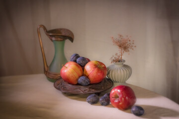 Beautiful background with apples and plums