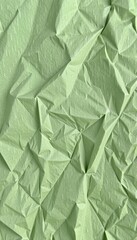 Obraz premium Subtle natural green recycled paper texture with visible fibers and a slightly rough surface, plant-based, background, organic paper