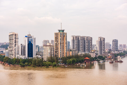 Waterside view of modern skyscrapers of Leshan, China
