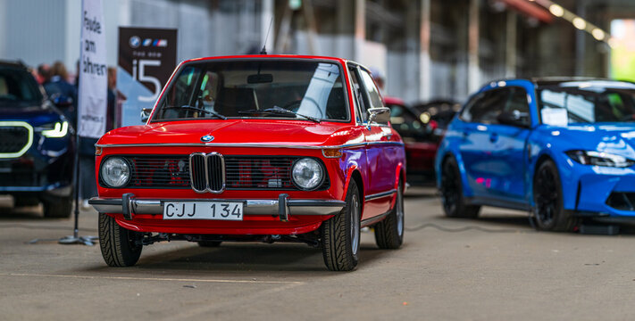 Gothenburg, Sweden - May 24 2025: Vintage red BMW classic car at indoor auto show.