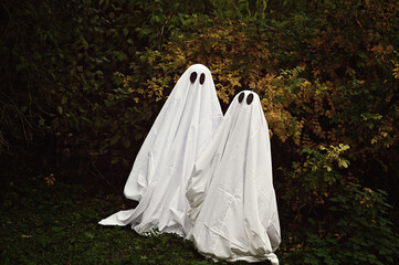 kids in ghost costumes