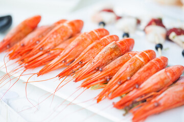 King prawns on a banquet. Starters table