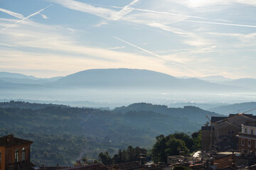 Scenic morning scene with the fog covering the valleys around Perugia, Umbria, Italy