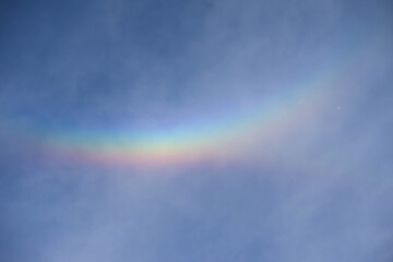Sun Dog Halo with Rainbow Light Phenomenon Close-Up in the Sky
