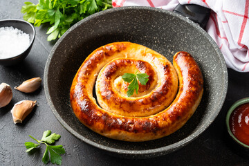 Sausages, grilled meat, pork bratwurst in the pan. Close up.