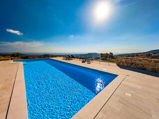 Infinity Pool Overlooking the Mediterranean Sea and Hills at Sunset – Luxury Villa View