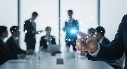 Image shows a hand touching a glowing network with people in background, symbolizing connection, technology, communication, and modern business