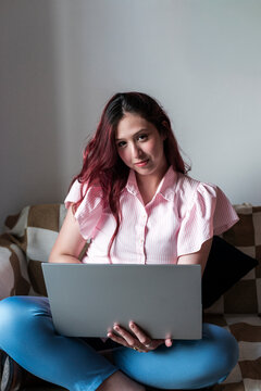 Serene female enjoying mindful break working with laptop
