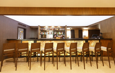 Interior of bar for guests to hotel, with wooden walls