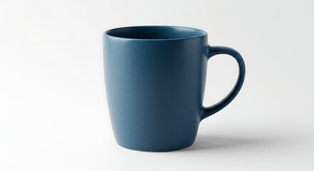 Obraz premium A Close-Up of a Ceramic Blue Mug on a White Background for Hot Beverages