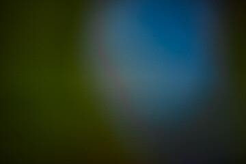 Soft green gradient background with smooth transitions and hints of yellow and brown, creating a...