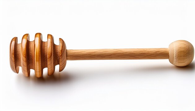 wooden honey dipper stick with grooves and ball end isolated on a white background