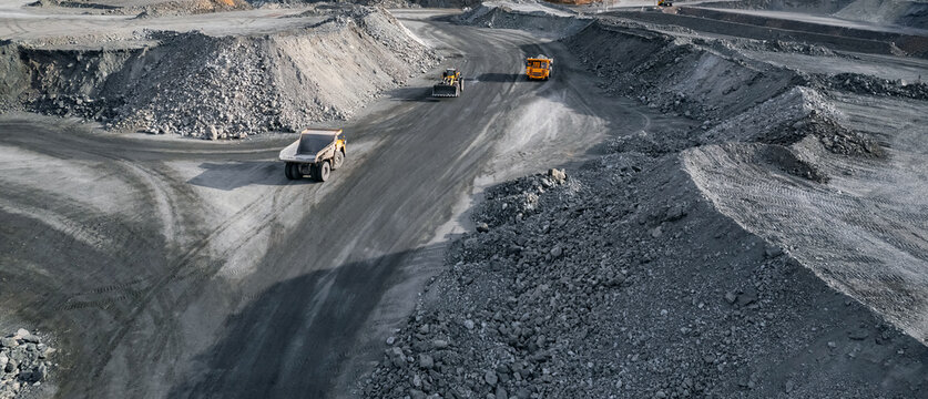 Open pit mine top view aerial drone, extractive industry for gold ore