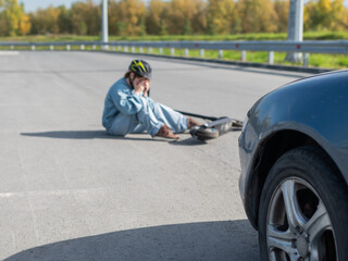 A Caucasian woman on a scooter after being hit by a car.