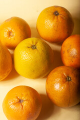 oranges on a yellow background