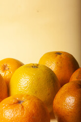 oranges on a yellow background