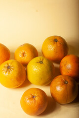 oranges on a yellow background