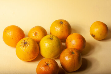 oranges on a yellow background