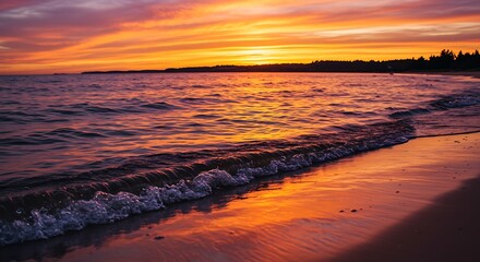 Obraz premium Sunset over the ocean beach scene