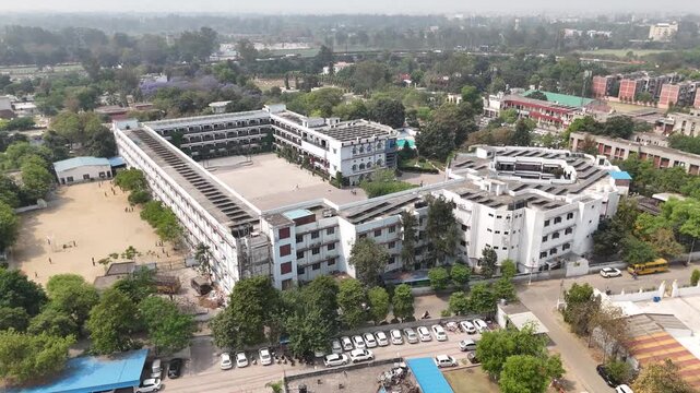 Aerial view of large school campus surrounded by greenery &ndash; Police DAV Public School, Jalandhar, Punjab, India &ndash; Oct 15th, 2025