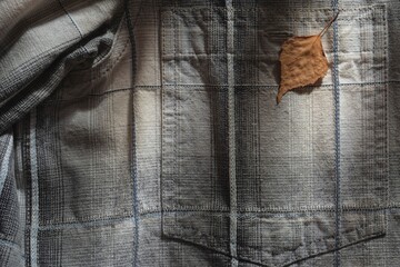 Abstract structure- wrinkles on the fabric. Textile-  simple dark background