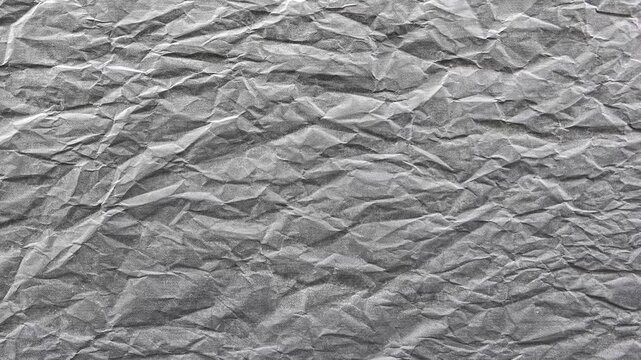 Fond anim&eacute; en boucle au style papier froiss&eacute; gris clair