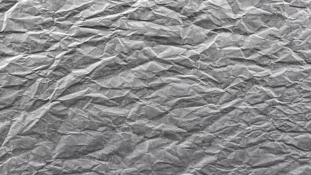 Fond anim&eacute; en boucle au style papier froiss&eacute; gris clair
