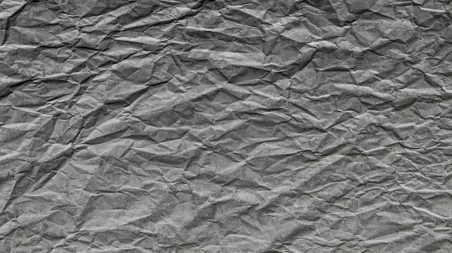 Fond anim&eacute; en boucle au style papier froiss&eacute; gris