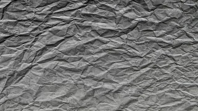 Fond anim&eacute; en boucle au style papier froiss&eacute; gris