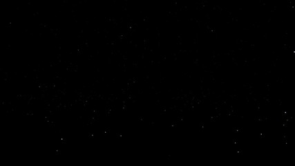 White glitter particles falling and bouncing on the back background