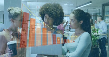 Three women analyzing data on laptop in office with translucent chart overlays, takeaway coffee cup