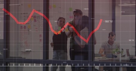 Three coworkers analyzing red line graph in glass-walled meeting area, using sticky notes