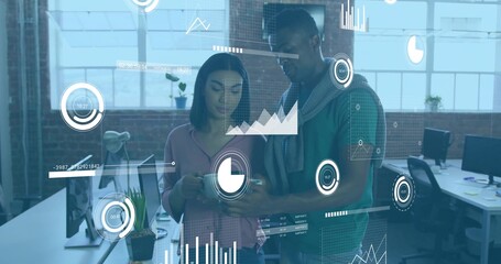 Examining bar, pie and line charts midair, coworkers analyzing data at startup office, with laptop