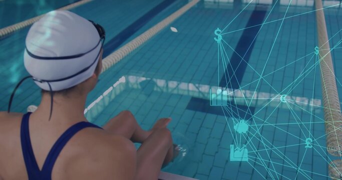 Sitting swimmer dipping feet into lap pool at pool center, holographic finance graphics, copy space - Powered by Adobe