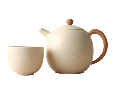 A charming speckled beige ceramic teapot with a wooden lid knob and handle, paired with a matching handleless cup. Ideal for Nordic or cozy tea/coffee mockups.