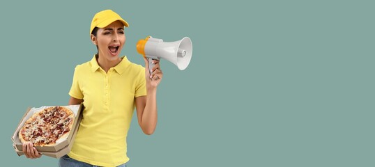 Female courier holding pizza and megaphone on color background with space for text