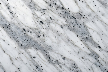 Diverse set of four abstract textures: luxurious dark marble with wavy white and gold streaks, two high-contrast gray porous foam surfaces, and light white marble with speckled gray and black veins.