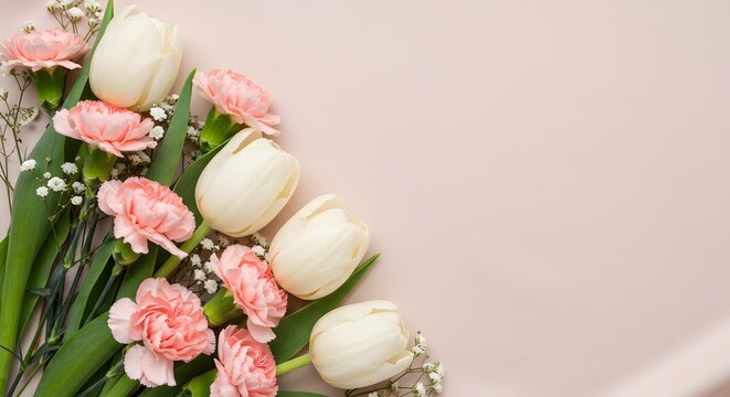 Spring Floral Arrangement of White Tulips and Pink Carnations on Soft Pastel Background with Copy Space for Mother's Day