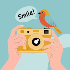 A delightful design featuring a colorful bird standing on a camera while encouraging a smile, exuding playful energy and inviting joy through its whimsical illustration.