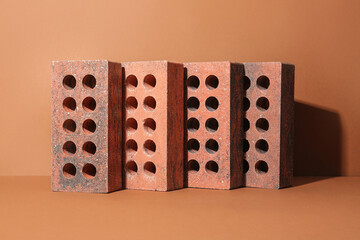 Brown bricks on orange background