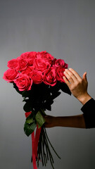 Bouquet of bright pink roses, flowers on a neutral background