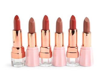 Obraz premium Set of different lipsticks on white background