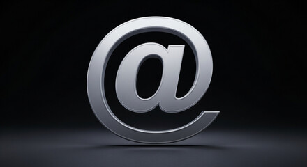 The at sign on a dark background, a widely recognized symbol used in email addresses and social media handles, representing connection and communication