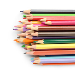 Many colorful pencils on white background