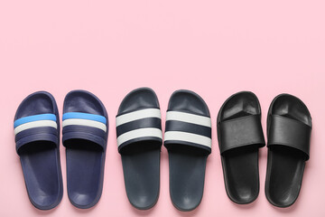 Different flip-flops on pink background