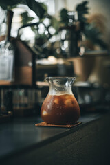 The hand-poured coffee sharing pot in the coffee shop, low-saturation colors and quiet environment