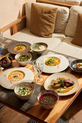 A Delicious Variety of Dishes Perfectly Arranged on a Cozy and Inviting Table Setting